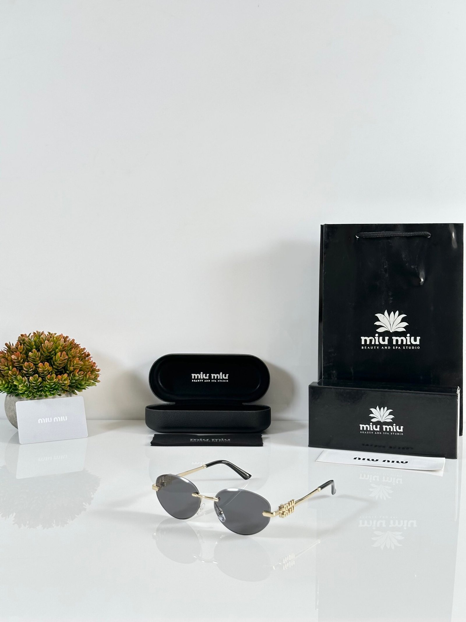 Miu Miu WMNS 1025 Gold Black