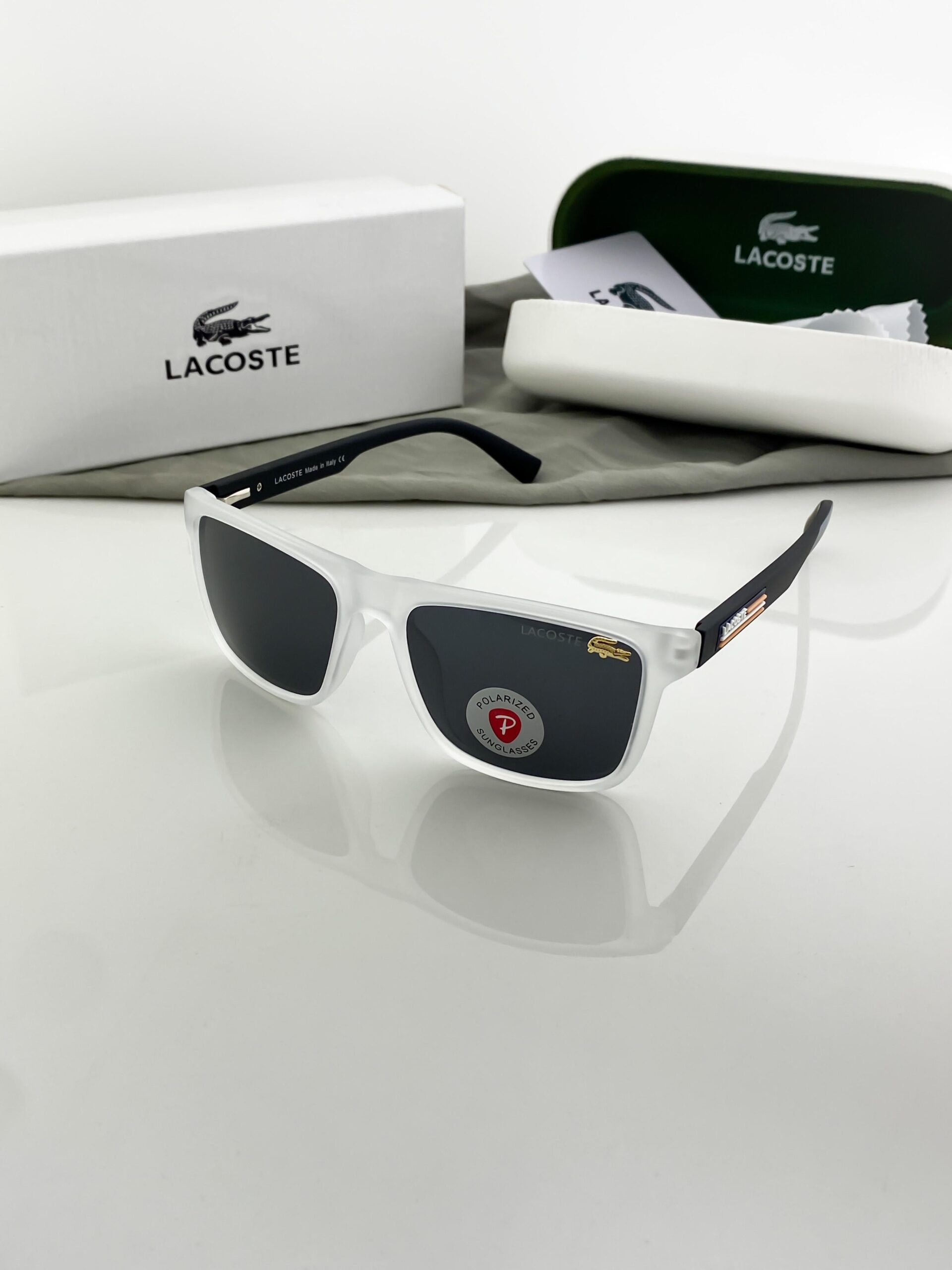 Lacost__ice black 2409 62